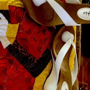 Summer  white Sandler. Can dress up or down.  Never worn.